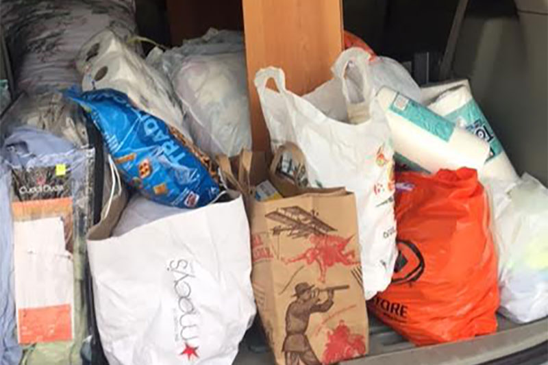 Local woman collects items for refugees