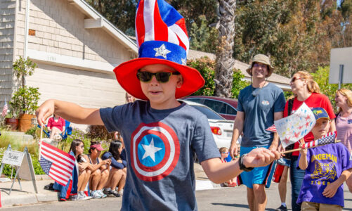 Colorful crowd enjoys parade
