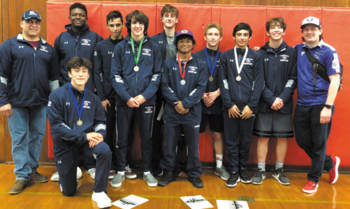 Proponents describe benefits of wrestling program