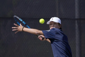 Tennis team advances before falling to Carlsbad