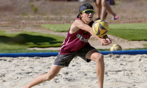 Beach volleyball team loses a close one